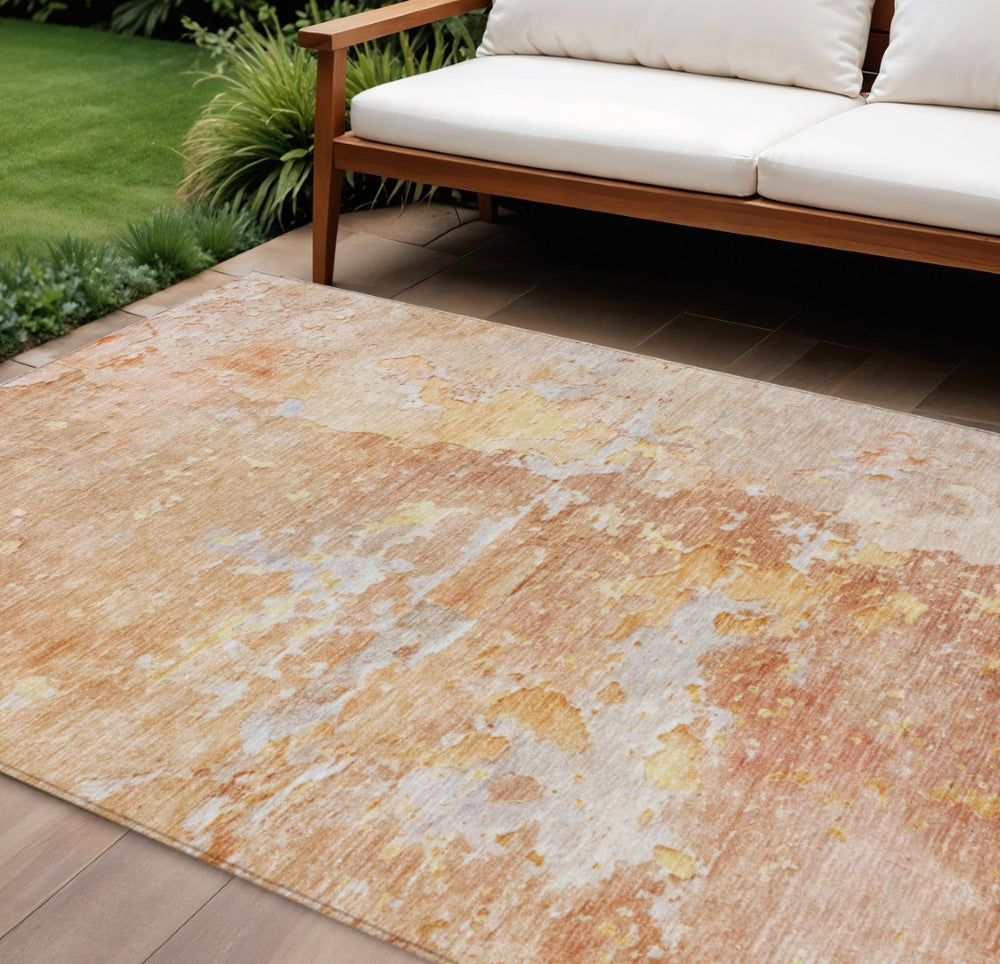 HomeRoots 5' Salmon Abstract Indoor Outdoor Area Rug - Durable, Washable Design for Modern Living Spaces 9' X 12' 607816