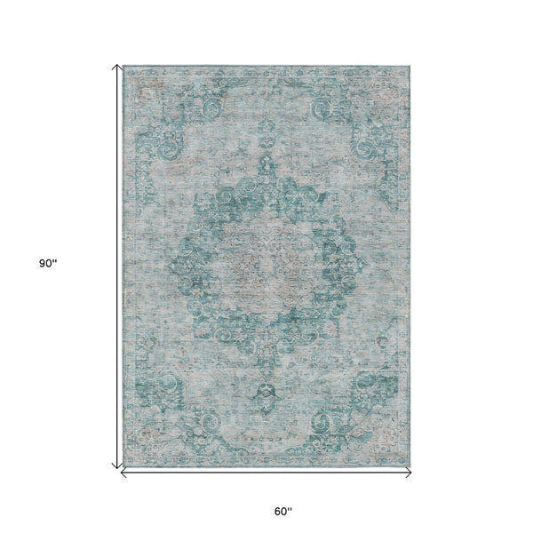 HomeRoots 5' Teal Blue Floral Medallion Area Rug – Durable, Washable, and Perfect for Indoor or Outdoor Spaces 5' X 8' 607945