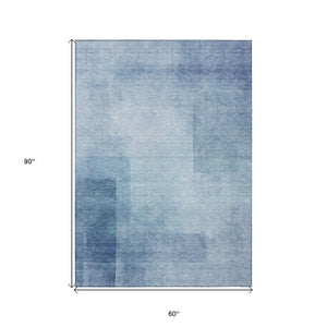 HomeRoots 5' Stylish Blue Geometric Washable Area Rug for Indoor and Outdoor Spaces - Durable & Easy Care 5' X 8' 608089