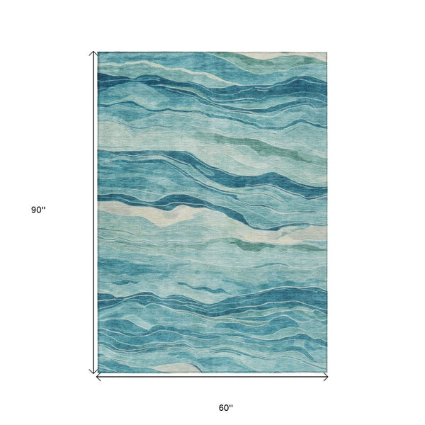 HomeRoots 5' Turquoise Striped Indoor Outdoor Area Rug - Durable, Washable, and Perfect for Coastal Spaces 5' X 8' 608131