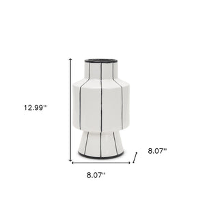 HomeRoots 13" Striking White and Black Striped Ceramic Cylinder Vase - Perfect for Fresh Floral Arrangements! 608358