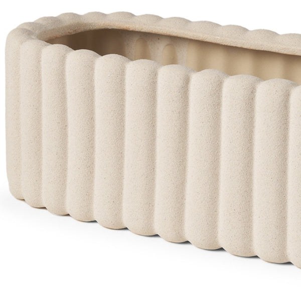 HomeRoots 6" Beige Oval Ceramic Vase with Ribbed Texture – Modern Decorative Accent for Stylish Interiors 608362
