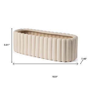 HomeRoots 6" Beige Oval Ceramic Vase with Ribbed Texture – Modern Decorative Accent for Stylish Interiors 608362