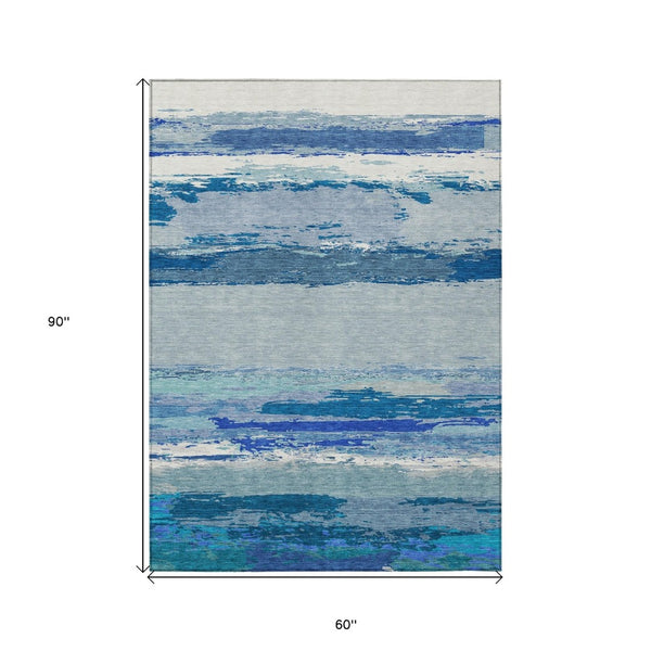 HomeRoots 5' Blue Abstract Indoor Outdoor Area Rug - Contemporary Design, Durable, Machine Washable, Versatile 5' X 8' 608638