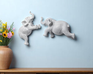 HomeRoots Set of Two Maynard I Gray Elephant Resin Sculptures - Handcrafted Wall Art for Rustic Charm 608653