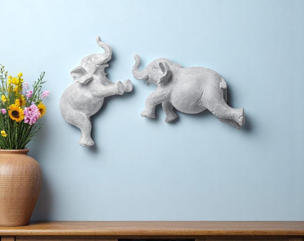 HomeRoots Set of Two Maynard I Gray Elephant Resin Sculptures - Handcrafted Wall Art for Rustic Charm 608653