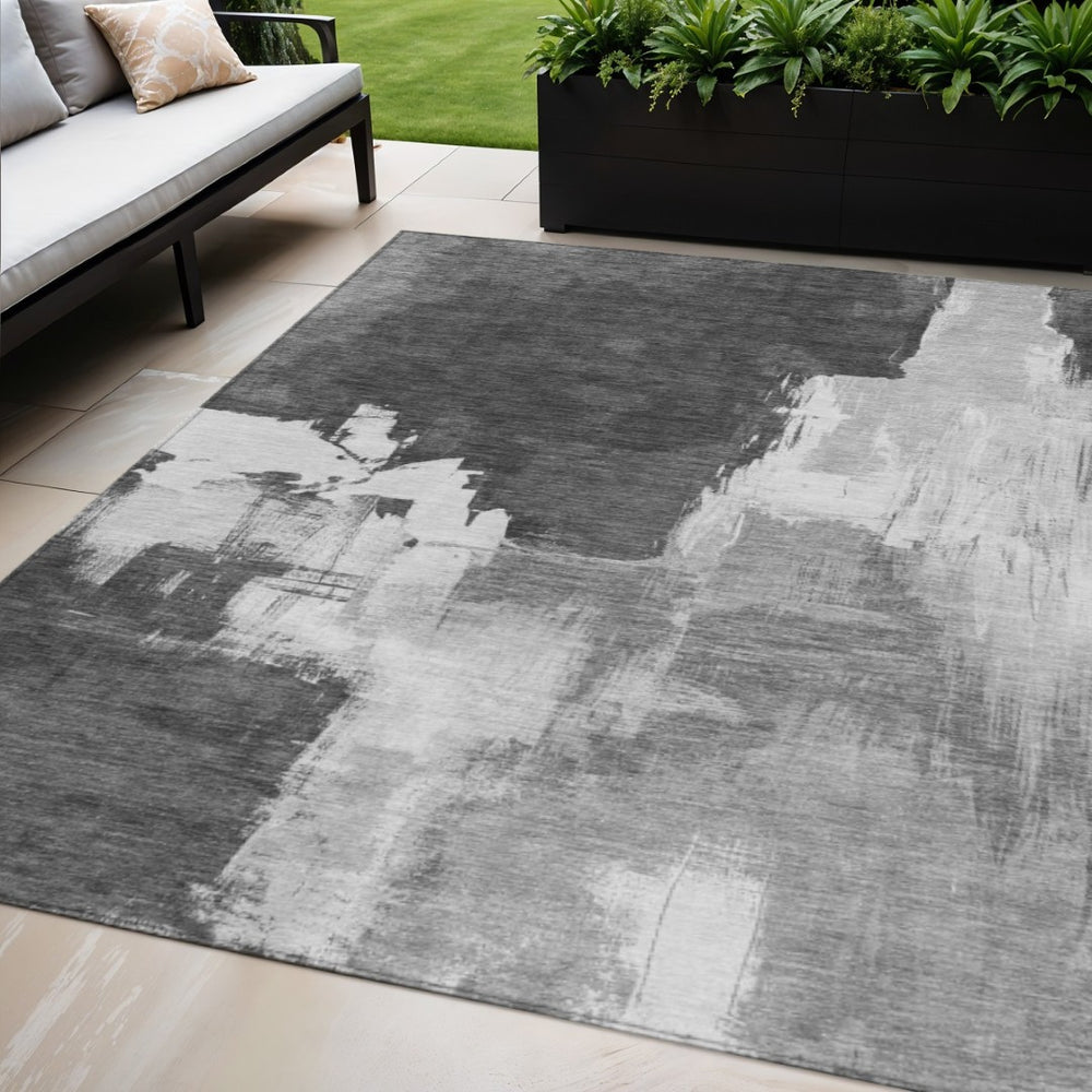 HomeRoots 5' Gray and Smoky Black Abstract Washable Area Rug for Stylish Indoor and Outdoor Spaces 5' X 8' 609167