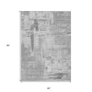 HomeRoots 5' Durable Gray and Off-White Abstract Washable Area Rug for Indoor and Outdoor High-Traffic Use 5' X 8' 609197