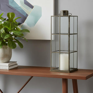 HomeRoots 23" Gold Distressed Geometric Metal and Glass Lantern - Elegant Candle Holder for Any Decor Style 609337