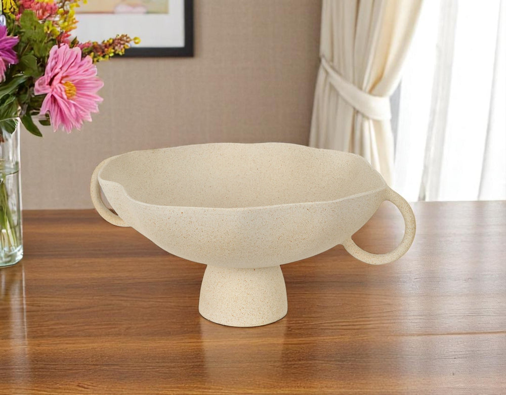 Homeroots 16" Elegant Beige Cast Aluminum Round Pedestal Bowl With Handles - Unique Home Décor Accent Piece   609353