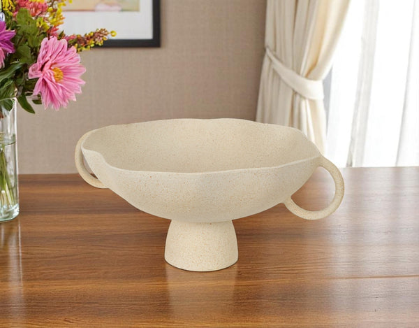 Homeroots 16" Elegant Beige Cast Aluminum Round Pedestal Bowl With Handles - Unique Home Décor Accent Piece   609353
