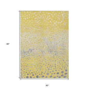 HomeRoots 5' Yellow and Gold Abstract Area Rug - Durable, Washable Indoor/Outdoor Design for Modern Spaces 5' X 8' 609469