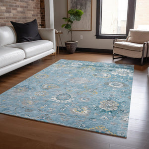 HomeRoots 5' Vibrant Teal Blue and Aqua Floral Washable Area Rug for Indoor and Outdoor Spaces - Durable Design 5' X 8' 609517