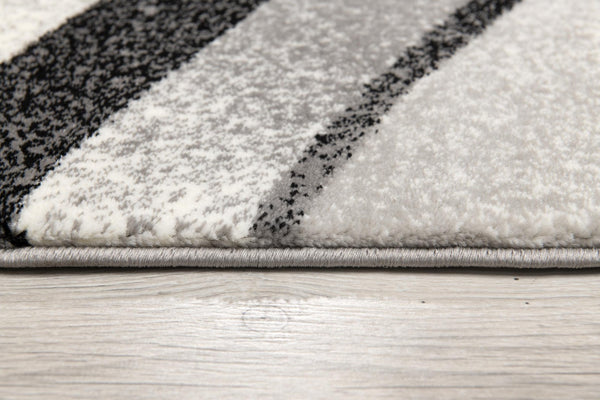 HomeRoots 17' Runner Rug - Black and Gray Abstract Design for High-Traffic Areas, Stain-Resistant & Stylish 609613