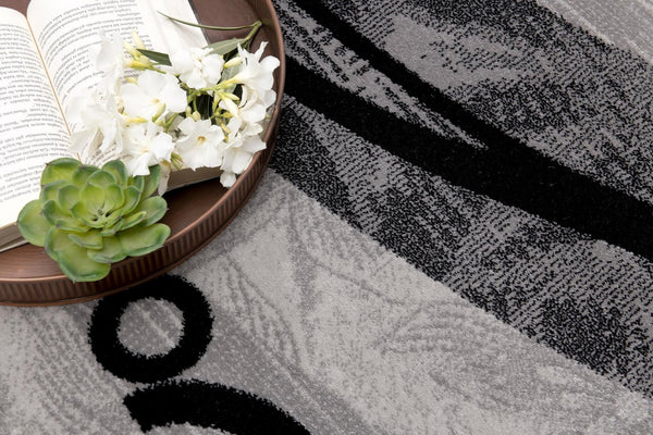 HomeRoots 2' x 25' Gray and Black Geometric Runner Rug - Modern, Durable, Stain-Resistant Design for Hallways 609631