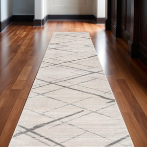 HomeRoots 2' Beige and Gray Abstract Runner Rug - Durable, Stain-Resistant, Modern Design for Entryways & Hallways 609709