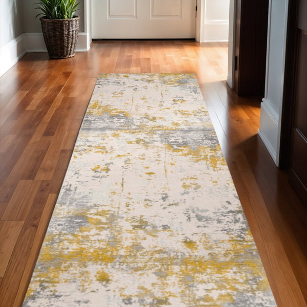 HomeRoots 2' Gold and Gray Abstract Runner Rug - Durable, Stain-Resistant, Soft Pile for Stylish Home Spaces 609825