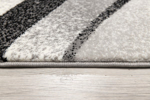 HomeRoots 18' Black and Gray Abstract Runner Rug - Stylish, Durable, Stain Resistant Accent for High-Traffic Areas 610111