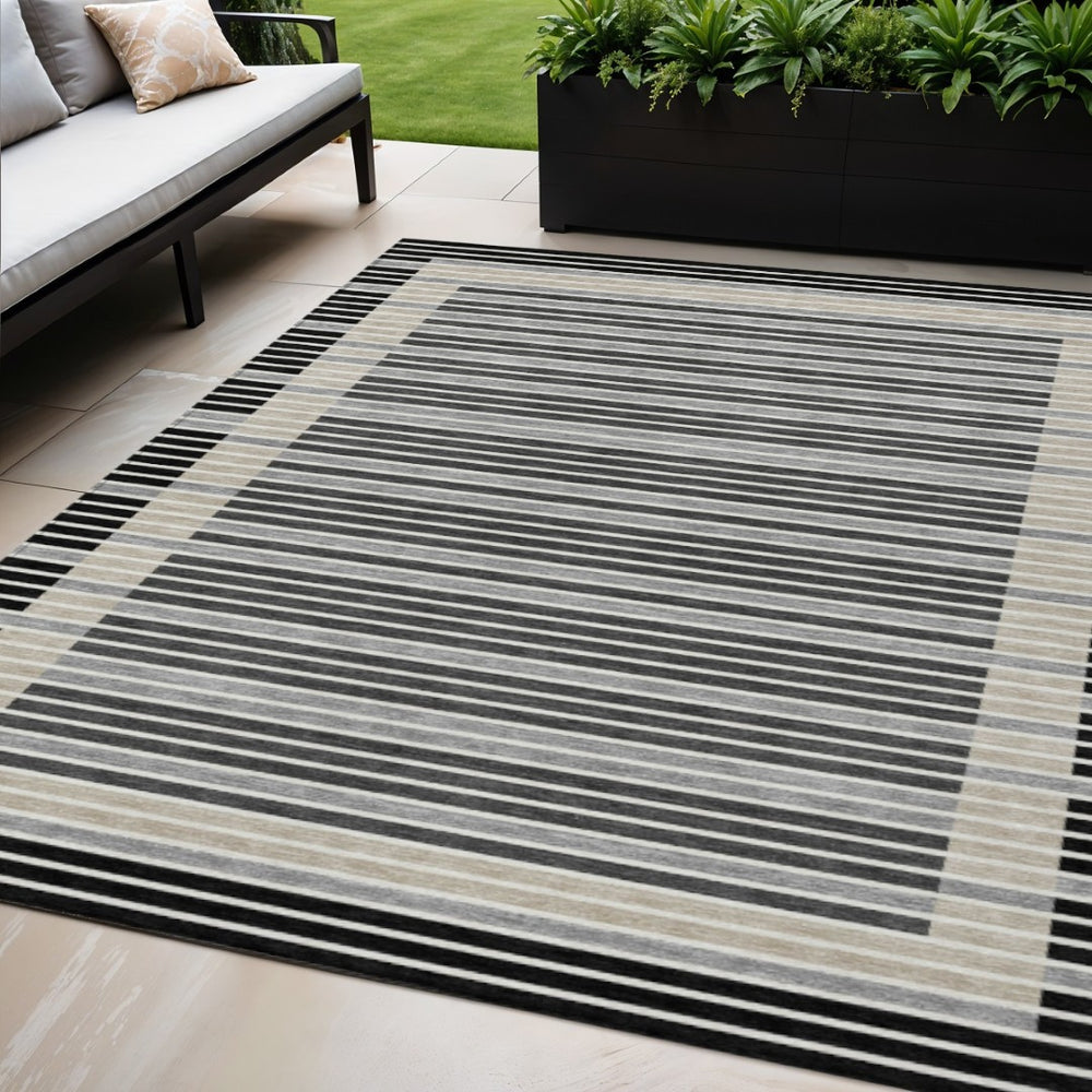 HomeRoots 5' Black and Beige Striped Washable Area Rug - Durable, Stylish Design for Indoor and Outdoor Spaces 5' X 8' 610457