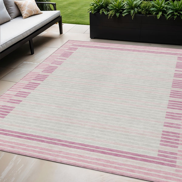 HomeRoots 5' Cheerful Pink and Ivory Striped Washable Area Rug for Indoor and Outdoor Spaces, Durable Design 5' X 8' 610493