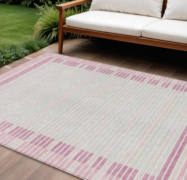 HomeRoots 5' Cheerful Pink and Ivory Striped Washable Area Rug for Indoor and Outdoor Spaces, Durable Design 10' X 14' 610497