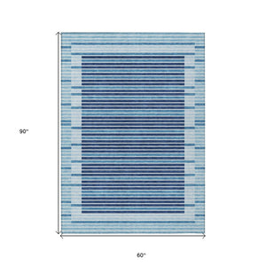HomeRoots 5' Sky Blue and Denim Striped Area Rug - Durable, Machine Washable for Indoor and Outdoor Spaces 5' X 8' 610505