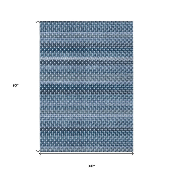 HomeRoots 5' Denim Blue and Sky Blue Striped Indoor Outdoor Rug - Durable, Washable, Coastal Charm for All Spaces 5' X 8' 610583