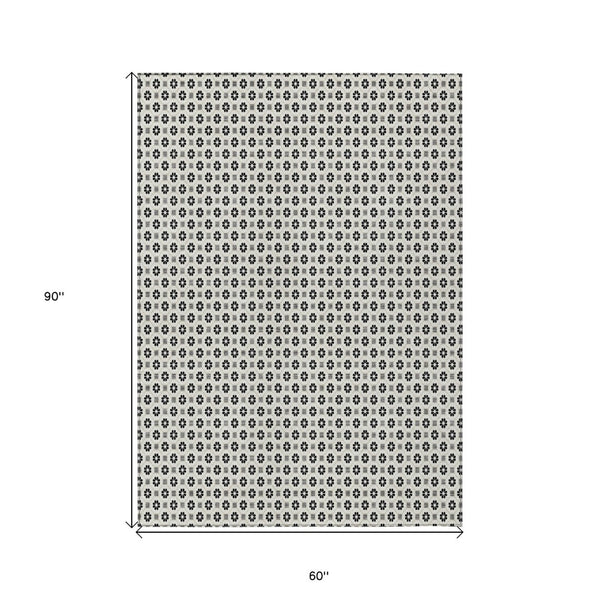 HomeRoots 5' Elegant Ivory and Black Floral Washable Area Rug for Indoor and Outdoor Spaces, Durable Design 5' X 8' 610655