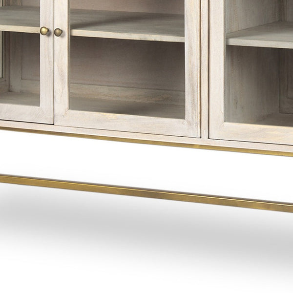 HomeRoots 70" Luxurious Gold and White Solid Wood Sideboard with Soft-Close Doors and Glass Shelving Storage 611016