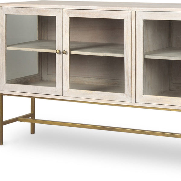 HomeRoots 70" Luxurious Gold and White Solid Wood Sideboard with Soft-Close Doors and Glass Shelving Storage 611016