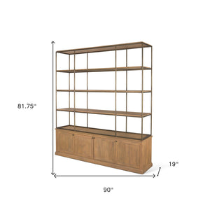Homeroots 82" Rustic Three Tier Bookcase In Antiqued Brass & Light Brown Metal With Distressed Wood Doors   611046