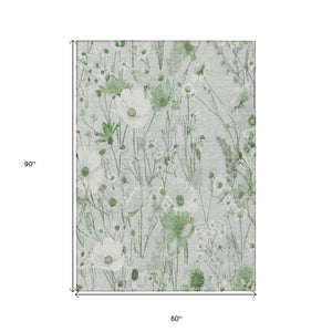 HomeRoots 5' Refreshing Mint Green and Ivory Floral Area Rug - Durable, Washable, Perfect for Indoors or Outdoors 5' X 8' 611157