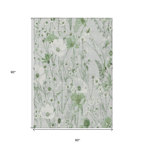 HomeRoots 5' Refreshing Mint Green and Ivory Floral Area Rug - Durable, Washable, Perfect for Indoors or Outdoors 5' X 8' 611157