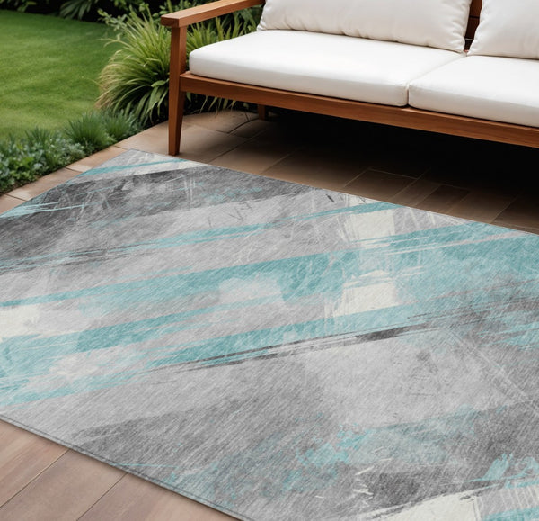 HomeRoots 5' Stylish Striped Washable Area Rug for Indoor and Outdoor Spaces - Durable, Easy-Clean Design Teal 10' x 14' 611434