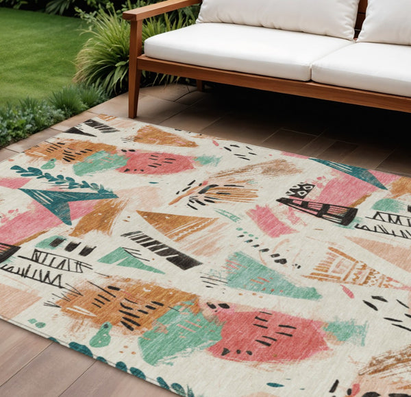 HomeRoots 5' Modern Abstract Washable Area Rug in Blush and Teal Blue for Indoor and Outdoor Spaces Ivory 9' x 12' 611668