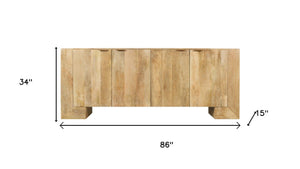 HomeRoots 86" Natural Distressed Solid Wood Sideboard - Stylish Storage Buffet with Four Doors & Bronze Accents 612066