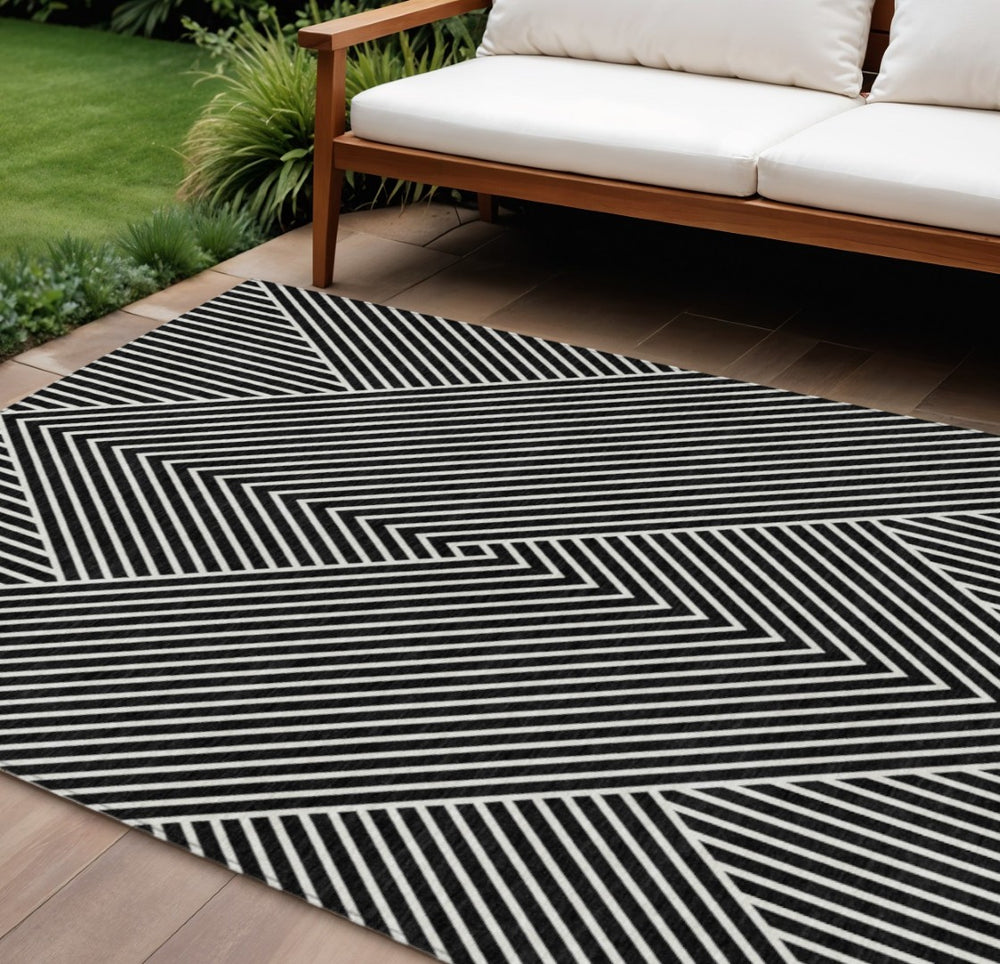 HomeRoots 5' Modern Black and Ivory Geometric Washable Area Rug for Indoor and Outdoor Spaces, Durable Design 9' X 12' 612110