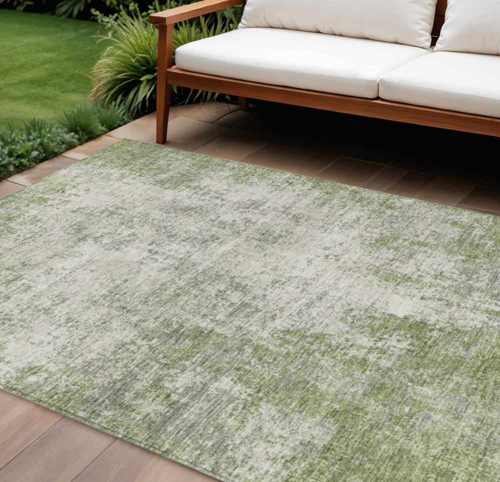 HomeRoots 5' Green and Ivory Abstract Area Rug – Stylish, Washable Design for Indoor and Outdoor Spaces 9' X 12' 612326