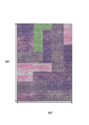 HomeRoots 5' Vibrant Geometric Washable Area Rug in Purple, Green & Pink - Perfect for Indoor & Outdoor Spaces 5' X 8' 612443