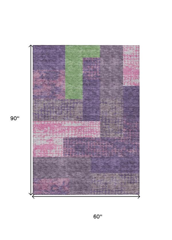 HomeRoots 5' Vibrant Geometric Washable Area Rug in Purple, Green & Pink - Perfect for Indoor & Outdoor Spaces 5' X 8' 612443
