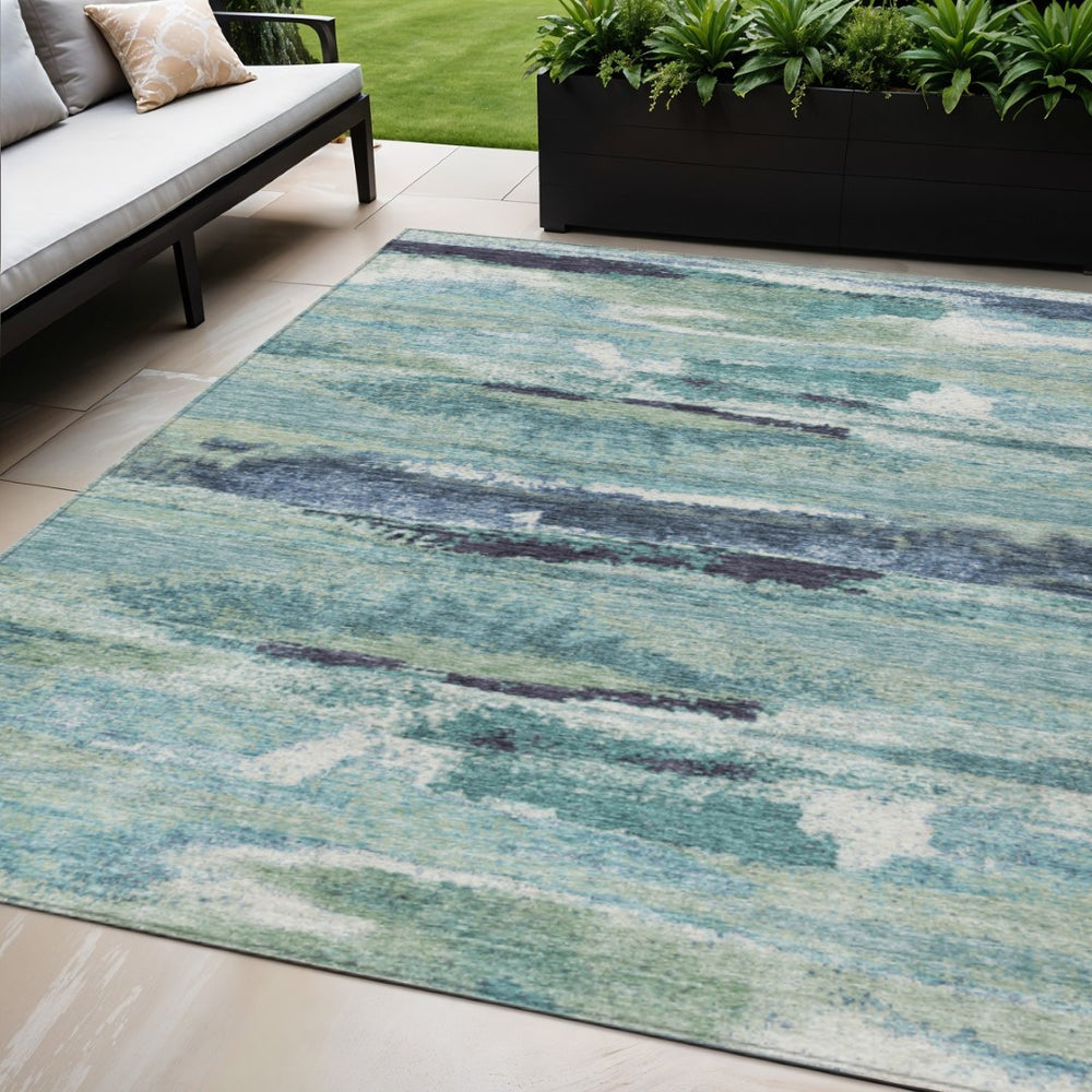 HomeRoots 5' Abstract Area Rug in Sage Teal and Navy Blue - Washable, Durable for Indoor and Outdoor Spaces 5' X 8' 612480