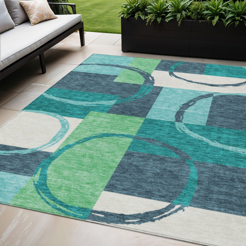 HomeRoots 5' Vibrant Teal Blue and Green Geometric Washable Area Rug for Indoor and Outdoor Spaces 5' X 8' 612594