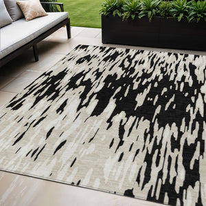 HomeRoots 5' Black and Ivory Abstract Area Rug – Durable, Washable Design for Indoor and Outdoor Use 5' X 8' 612636
