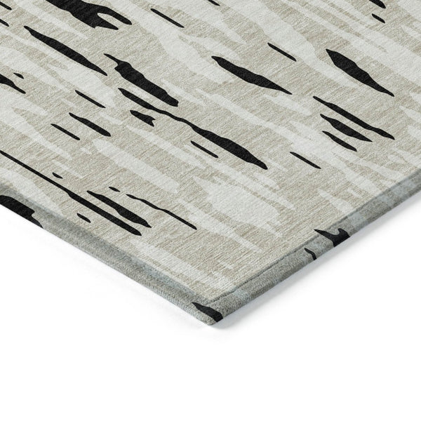 HomeRoots 5' Black and Ivory Abstract Area Rug – Durable, Washable Design for Indoor and Outdoor Use 5' X 8' 612636