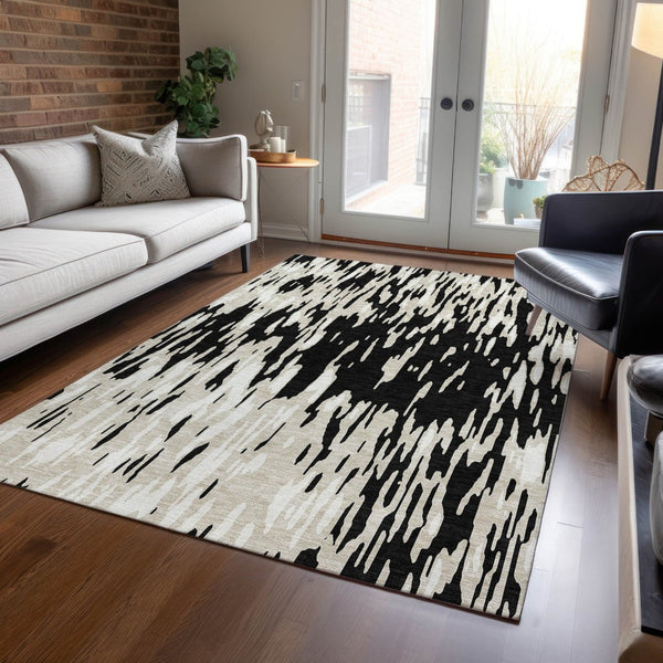 HomeRoots 5' Black and Ivory Abstract Area Rug – Durable, Washable Design for Indoor and Outdoor Use 8' X 10' 612638