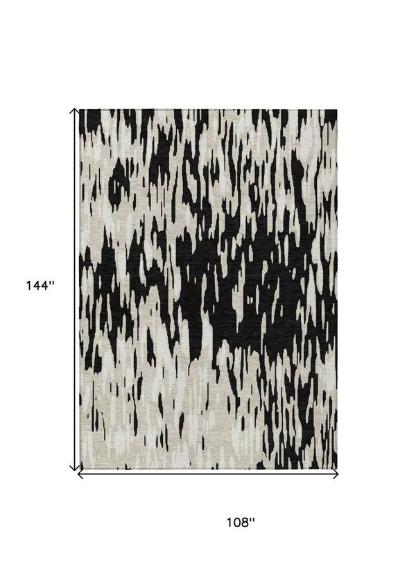 HomeRoots 5' Black and Ivory Abstract Area Rug – Durable, Washable Design for Indoor and Outdoor Use 9' X 12' 612639
