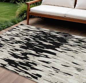 HomeRoots 5' Black and Ivory Abstract Area Rug – Durable, Washable Design for Indoor and Outdoor Use 10' X 14' 612640