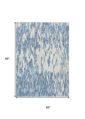 HomeRoots 5' Denim Blue and Ivory Abstract Area Rug – Stylish, Washable Design for Indoor and Outdoor Spaces 5' X 8' 612648