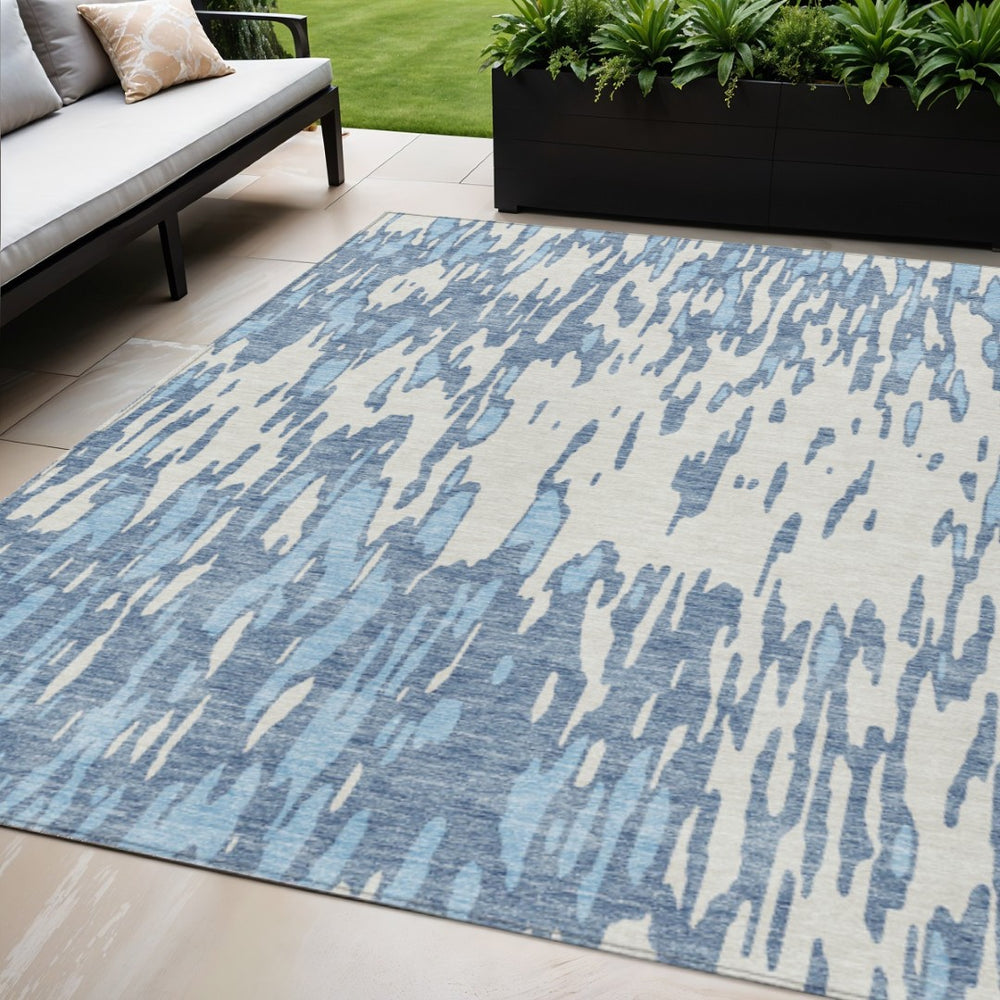 HomeRoots 5' Denim Blue and Ivory Abstract Area Rug – Stylish, Washable Design for Indoor and Outdoor Spaces 5' X 8' 612648