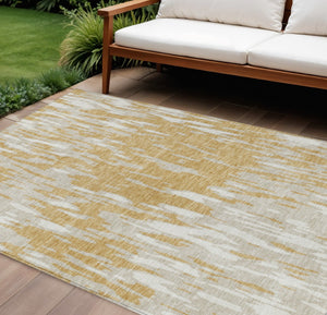 HomeRoots 5' Gold and Ivory Abstract Area Rug - Durable, Washable Design for Indoor and Outdoor Spaces 9' X 12' 612663
